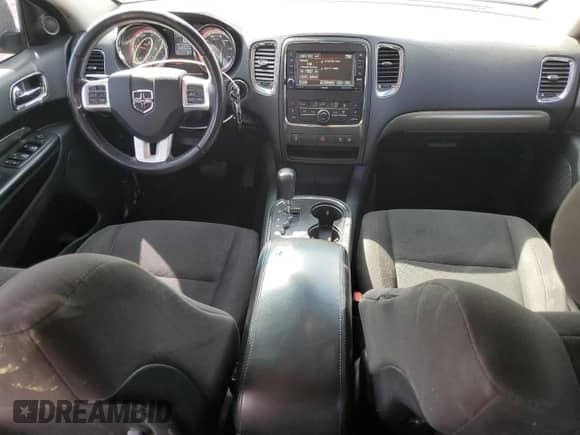 2013 Dodge Durango SXT с VIN 1C4RDJAG5DC668104, выставлен на аукционе Copart как лот 80276935 с пробегом 168 781 миль миль и Списание • Salvage title. История ставок и продаж доступна на DreamBid. Изображение 8.