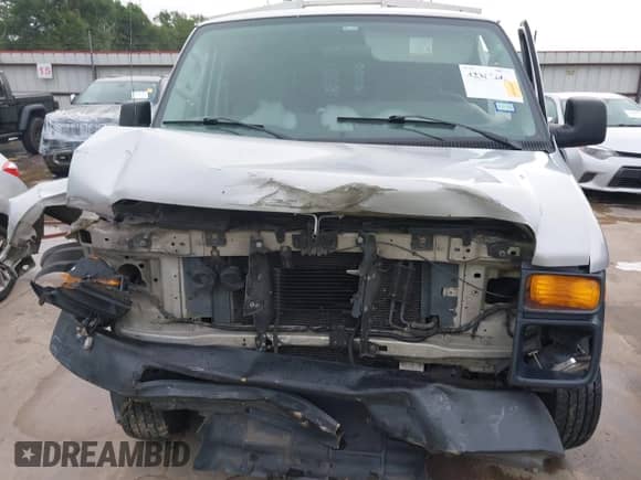 2009 Ford Econoline Cargo Commercial z VIN 1FTNE14W29DA56023, wystawiony jako IAAI lot #42362663 z przebiegiem 211 326 mil mil oraz . Historia ofert i sprzedaży dostępna na DreamBid. Obrazek 12.