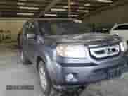 2011 Honda Pilot EX-L z VIN 5FNYF4H7XBB084519, wystawiony jako Copart lot #68644595 z przebiegiem 186 578 mil mil oraz Szkoda całkowita • Salvage title. Historia ofert i sprzedaży dostępna na DreamBid. Obrazek 14.