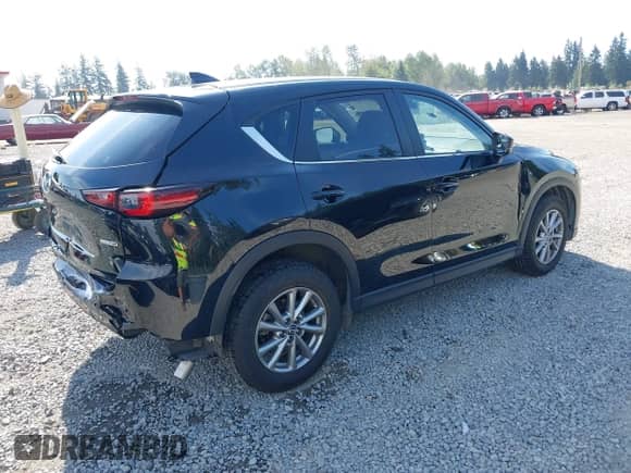 2022 Mazda CX-5 S Select z VIN JM3KFBBM2N0572561, wystawiony jako IAAI lot #42757352 z przebiegiem 33 952 mil mil oraz . Historia ofert i sprzedaży dostępna na DreamBid. Obrazek 4.