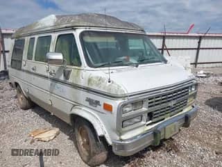 1994 Chevrolet Chevy Van z VIN 1GBEG25K2RF149919, wystawiony jako IAAI lot #42631085 z przebiegiem 282 453 mil mil oraz . Historia ofert i sprzedaży dostępna na DreamBid. Obrazek 1.