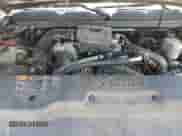 2014 Chevrolet Silverado 2500HD Work Truck z VIN 1GC1KVC83EF137290, wystawiony jako Copart lot #80095975 z przebiegiem 163 019 mil mil oraz Szkoda całkowita • Salvage title. Historia ofert i sprzedaży dostępna na DreamBid. Obrazek 11.