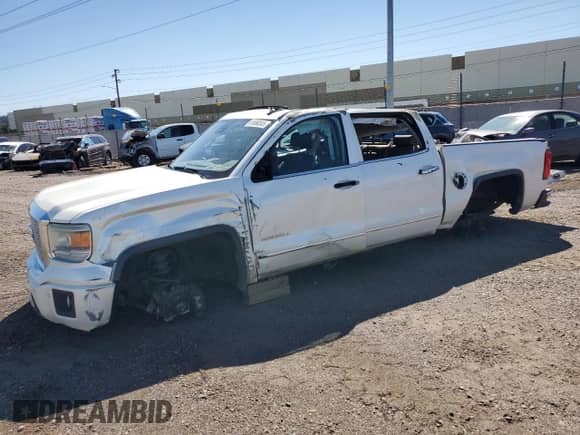 2015 GMC Sierra 1500 Denali z VIN 3GTU2WEC1FG320062, wystawiony jako Copart lot #81668345 z przebiegiem 132 850 mil mil oraz Szkoda całkowita • Salvage title. Historia ofert i sprzedaży dostępna na DreamBid. Obrazek 1.