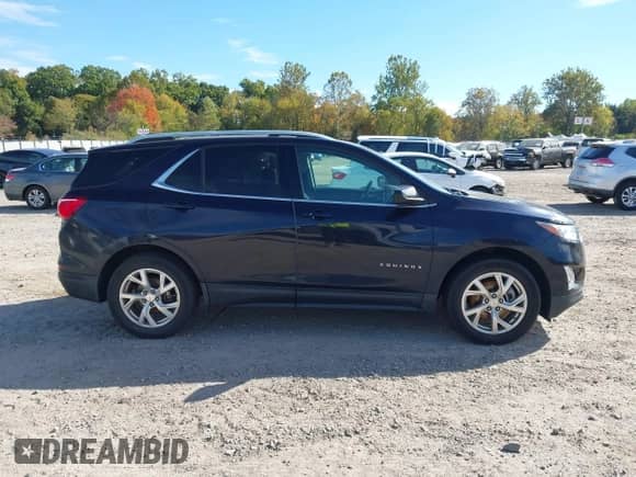 2020 Chevrolet Equinox LT with VIN 3GNAXVEX8LS620957, listed as a IAAI auction lot 43474526 with 36,061 mi miles and . Bid and sale history available at DreamBid. Image 13.