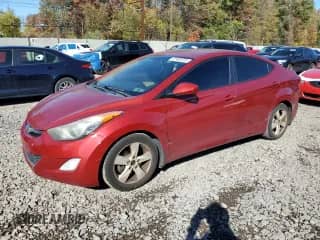 2013 Hyundai Elantra GLS z VIN KMHDH4AE6DU575855, wystawiony jako Copart lot #87485725 z przebiegiem 193 098 mil mil oraz Szkoda całkowita • Salvage title. Historia ofert i sprzedaży dostępna na DreamBid. Obrazek 1.
