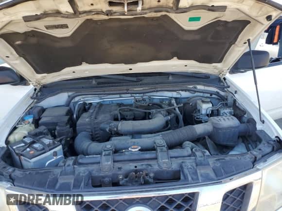 2014 Nissan Frontier S with VIN 1N6BD0CT2EN719566, listed as a Copart auction lot 64044835 with 182,883 mi miles and Salvage title. Bid and sale history available at DreamBid. Image 11.