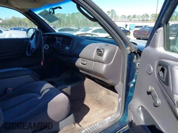 1998 Dodge Dakota SLT with VIN 1B7GG22Y0WS524464, listed as a IAAI auction lot 41806151 with 185,380 mi miles and . Bid and sale history available at DreamBid. Image 5.