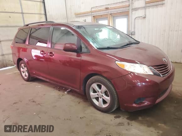 2015 Toyota Sienna LE with VIN 5TDKK3DC6FS551371, listed as a Copart auction lot 81857465 with 144,689 mi miles and Salvage title. Bid and sale history available at DreamBid. Image 4.