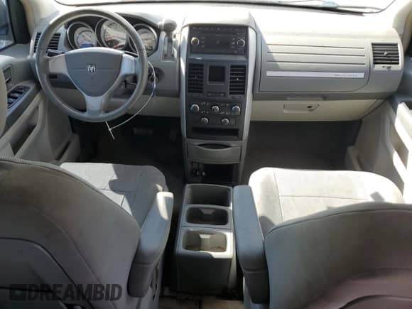 2008 Dodge Grand Caravan SXT z VIN 2D8HN54P48R716105, wystawiony jako Copart lot #84782085 z przebiegiem 233 016 mil mil oraz Szkoda całkowita • Salvage title. Historia ofert i sprzedaży dostępna na DreamBid. Obrazek 8.