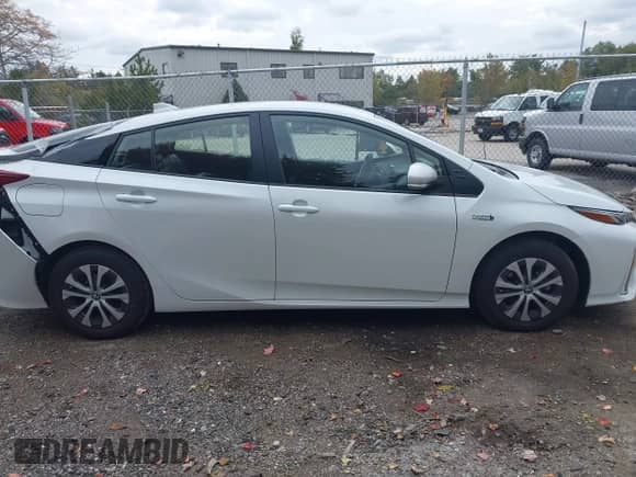 2022 Toyota Prius XLE with VIN JTDKAMFP9N3220440, listed as a IAAI auction lot 43428027 with 34,374 mi miles and . Bid and sale history available at DreamBid. Image 13.