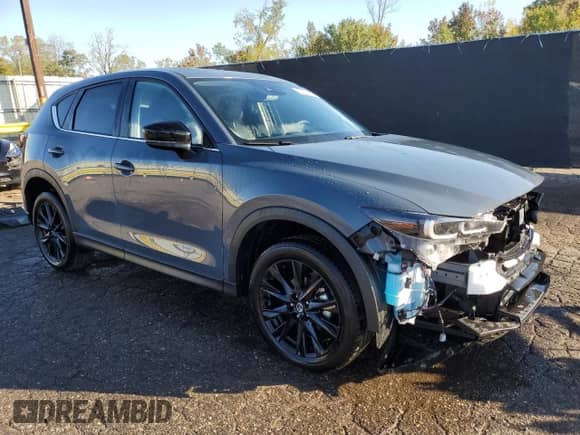 2025 Mazda CX-5 S Carbon Edition z VIN JM3KFBCM0S0676170, wystawiony jako Copart lot #84020165 z przebiegiem 11 754 mil mil oraz Czysty tytuł • Clean title. Historia ofert i sprzedaży dostępna na DreamBid. Obrazek 4.