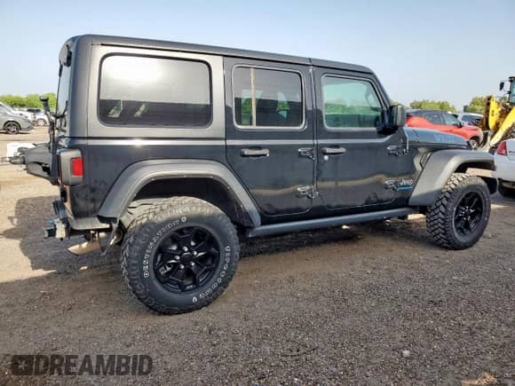 2023 Jeep Wrangler with VIN 1C4JJXN66PW611651, listed as a Copart auction lot 64452315 with 30,924 mi miles and Salvage title. Bid and sale history available at DreamBid. Image 3.