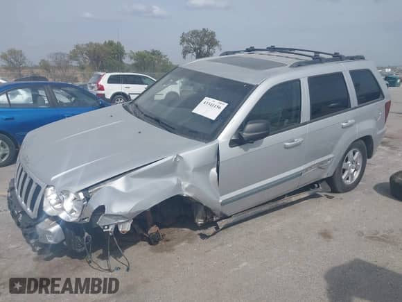 2009 Jeep Grand Cherokee Laredo with VIN 1J8GR48KX9C520745, listed as a IAAI auction lot 43341156 with 171,205 mi miles and . Bid and sale history available at DreamBid. Image 17.