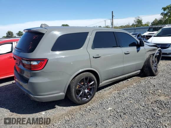 2019 Dodge Durango SRT with VIN 1C4SDJGJ2KC645431, listed as a Copart auction lot 71664475 with 90,061 mi miles and Salvage title. Bid and sale history available at DreamBid. Image 3.