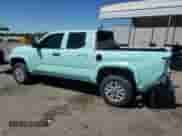 2024 Toyota Tacoma SR with VIN 3TYKD5HNXRT000886, listed as a Copart auction lot 66936505 with 21,648 mi miles and Salvage title. Bid and sale history available at DreamBid. Image 2.