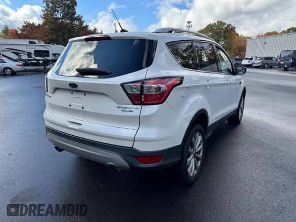 2017 Ford Escape Titanium with VIN 1FMCU9JD7HUE28039, listed as a Copart auction lot 89850105 with 107,762 mi miles and Clean title. Bid and sale history available at DreamBid. Image 3.