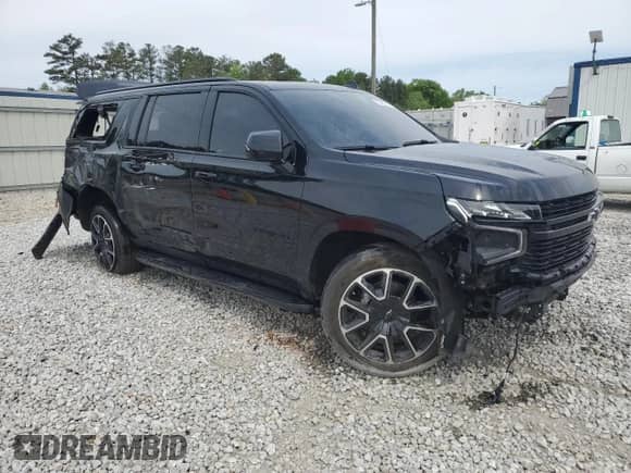 2023 Chevrolet Suburban RST с VIN 1GNSKEKL1PR227556, выставлен на аукционе Copart как лот 53263065 с пробегом 37 731 миль миль и Списание • Salvage title. История ставок и продаж доступна на DreamBid. Изображение 4.