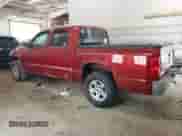 2006 Dodge Dakota SLT with VIN 1D7HE48N06S641079, listed as a Copart auction lot 61915825 with 120,387 mi miles and Salvage title. Bid and sale history available at DreamBid. Image 2.