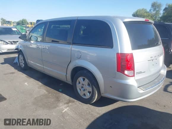 2012 Dodge Grand Caravan SE z VIN 2C4RDGBG7CR115283, wystawiony jako IAAI lot #42830485 z przebiegiem 233 317 mil mil oraz . Historia ofert i sprzedaży dostępna na DreamBid. Obrazek 3.