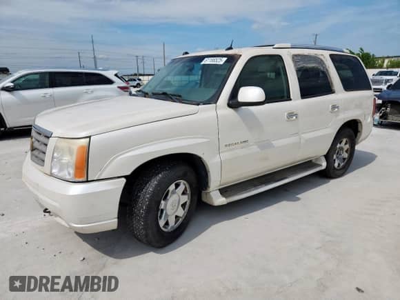 2005 Cadillac Escalade с VIN 1GYEC63N55R202532, выставлен на аукционе Copart как лот 61166525 с пробегом 229 312 миль миль и Чистый • Clean title. История ставок и продаж доступна на DreamBid. Изображение 1.