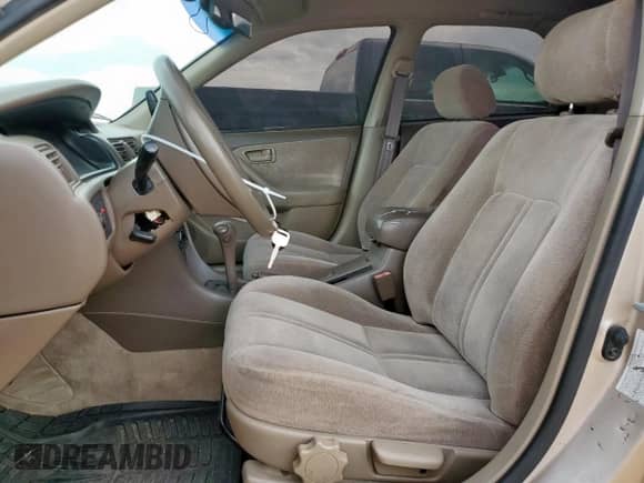 1997 Toyota Camry LE с VIN 4T1BG22K5VU081927, выставлен на аукционе Copart как лот 70648635 с пробегом 87 953 миль миль и Списание • Salvage title. История ставок и продаж доступна на DreamBid. Изображение 7.