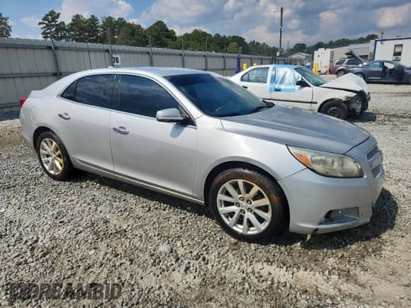 2013 Chevrolet Malibu LTZ с VIN 1G11H5SA9DF333518, выставлен на аукционе Copart как лот 81212465 с пробегом 206 487 миль миль и Списание • Salvage title. История ставок и продаж доступна на DreamBid. Изображение 4.