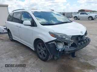 2015 Toyota Sienna SE with VIN 5TDXK3DC9FS669405, listed as a IAAI auction lot 42590910 with 82,127 mi miles and . Bid and sale history available at DreamBid. Image 1.