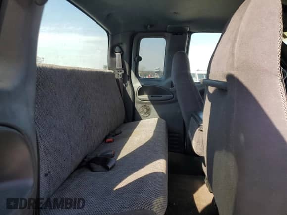 1999 Dodge 2500 с VIN 1B7KC23Z0XJ594695, выставлен на аукционе Copart как лот 50990825 с пробегом 235 365 миль миль и Чистый • Clean title. История ставок и продаж доступна на DreamBid. Изображение 10.