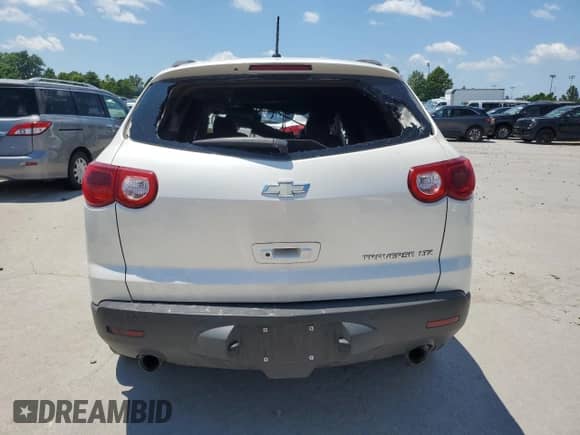 2011 Chevrolet Traverse LTZ с VIN 1GNKRLED3BJ127809, выставлен на аукционе Copart как лот 62907135 с пробегом Не указан миль и На запчасти • Non repairable. История ставок и продаж доступна на DreamBid. Изображение 6.