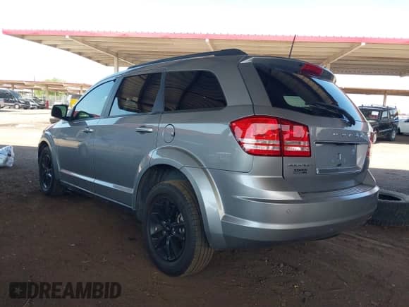 2020 Dodge Journey SE Value with VIN 3C4PDCAB3LT232412, listed as a IAAI auction lot 43155162 with 58,779 mi miles and . Bid and sale history available at DreamBid. Image 3.