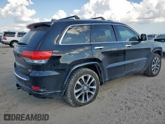 2017 Jeep Grand Cherokee Overland with VIN 1C4RJFCG0HC834375, listed as a Copart auction lot 85707185 with 138,240 mi miles and Salvage title. Bid and sale history available at DreamBid. Image 3.