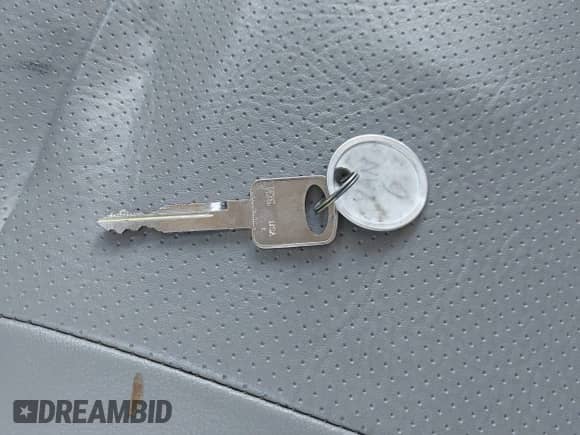 2002 Ford Econoline Cargo with VIN 1FTNE242X2HA90857, listed as a IAAI auction lot 42716391 with 103,796 mi miles and . Bid and sale history available at DreamBid. Image 11.