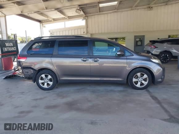 2012 Toyota Sienna LE AAS with VIN 5TDKK3DC6CS193748, listed as a IAAI auction lot 43190621 with 197,152 mi miles and . Bid and sale history available at DreamBid. Image 14.