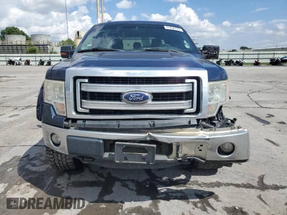 2013 Ford F-150 XLT с VIN 1FTFW1EF4DFB98001, выставлен на аукционе Copart как лот 71452475 с пробегом 215 048 миль миль и Списание • Salvage title. История ставок и продаж доступна на DreamBid. Изображение 5.