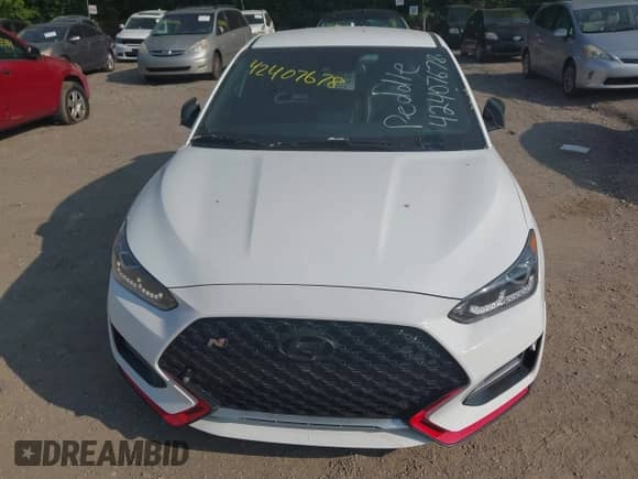 2021 Hyundai Veloster z VIN KMHT36AH7MU010143, wystawiony jako IAAI lot #42407678 z przebiegiem 43 444 mil mil oraz . Historia ofert i sprzedaży dostępna na DreamBid. Obrazek 6.