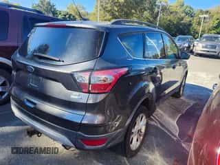 2018 Ford Escape SE with VIN 1FMCU9GD5JUD47165, listed as a IAAI auction lot 43520991 with 114,793 mi miles and . Bid and sale history available at DreamBid. Image 4.