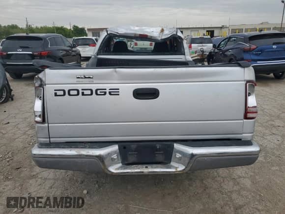 2001 Dodge Dakota Sport с VIN 1B7GL22N61S172663, выставлен на аукционе Copart как лот 58068695 с пробегом 128 576 миль миль и Списание • Salvage title. История ставок и продаж доступна на DreamBid. Изображение 6.
