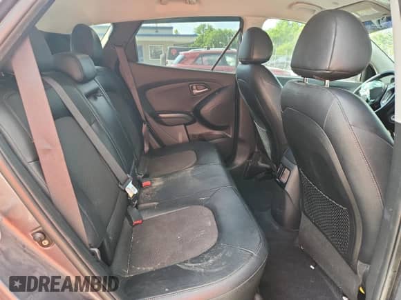 2015 Hyundai Tucson SE z VIN KM8JUCAG9FU991153, wystawiony jako Copart lot #63429555 z przebiegiem 160 649 mil mil oraz Szkoda całkowita • Salvage title. Historia ofert i sprzedaży dostępna na DreamBid. Obrazek 11.