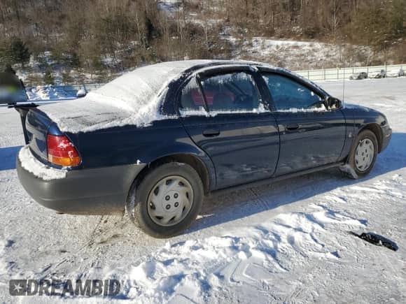 1999 Saturn SL с VIN 1G8ZF5283XZ157513, выставлен на аукционе Copart как лот 89053385 с пробегом 167 847 миль миль и Списание • Salvage title. История ставок и продаж доступна на DreamBid. Изображение 3.