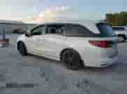 2023 Honda Odyssey Sport z VIN 5FNRL6H79PB014946, wystawiony jako Copart lot #69209405 z przebiegiem 119 907 mil mil oraz Szkoda całkowita • Salvage title. Historia ofert i sprzedaży dostępna na DreamBid. Obrazek 2.