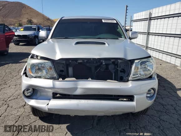 2005 Toyota Tacoma PreRunner with VIN 5TEJU62N55Z017095, listed as a Copart auction lot 86889355 with 191,217 mi miles and Salvage title. Bid and sale history available at DreamBid. Image 5.
