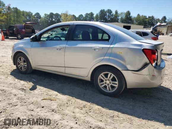 2016 Chevrolet Sonic LT with VIN 1G1JC5SHXG4181762, listed as a Copart auction lot 71091205 with 120,989 mi miles and Salvage title. Bid and sale history available at DreamBid. Image 2.