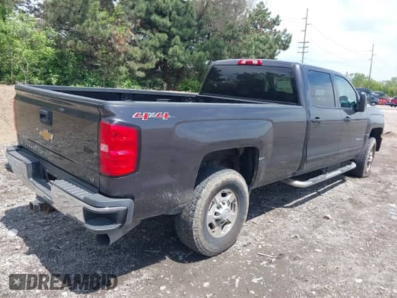 2015 Chevrolet Silverado 2500HD LT z VIN 1GC1KVE82FF572185, wystawiony jako IAAI lot #42207194 z przebiegiem 245 109 mil mil oraz . Historia ofert i sprzedaży dostępna na DreamBid. Obrazek 4.