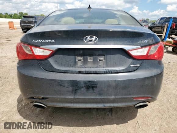2012 Hyundai Sonata Limited с VIN 5NPEC4AB0CH396524, выставлен на аукционе Copart как лот 69050765 с пробегом 218 134 миль миль и Списание • Salvage title. История ставок и продаж доступна на DreamBid. Изображение 6.