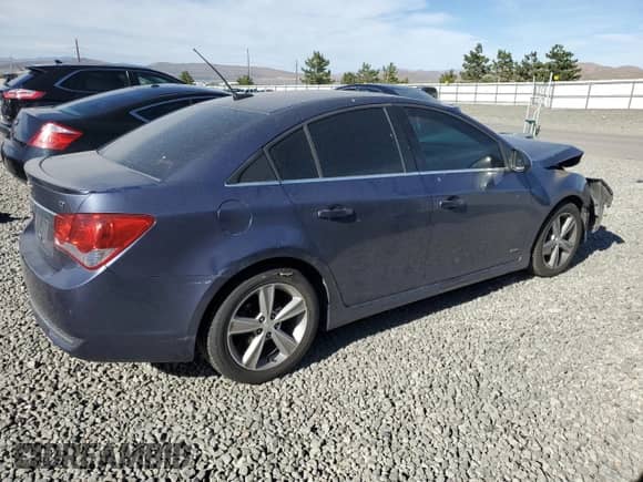 2013 Chevrolet Cruze 2LT с VIN 1G1PE5SB4D7121180, выставлен на аукционе Copart как лот 65310255 с пробегом 141 984 миль миль и Списание • Salvage title. История ставок и продаж доступна на DreamBid. Изображение 3.