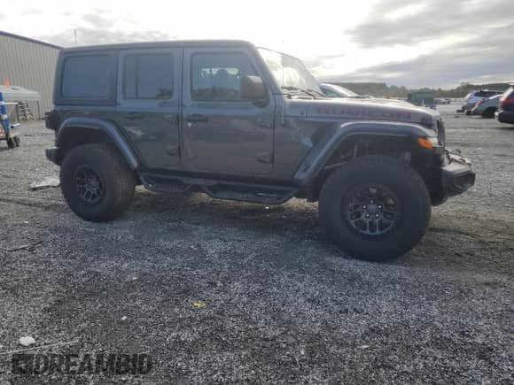 2022 Jeep Wrangler Unlimited Rubicon z VIN 1C4JJXFG6NW238566, wystawiony jako Copart lot #84026995 z przebiegiem 23 187 mil mil oraz Szkoda całkowita • Salvage title. Historia ofert i sprzedaży dostępna na DreamBid. Obrazek 4.