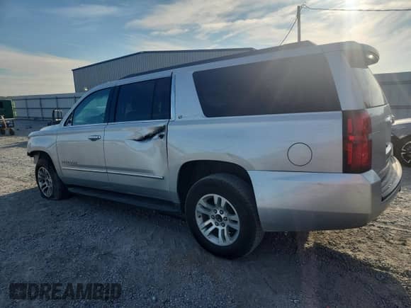 2020 Chevrolet Suburban LT с VIN 1GNSKHKC4LR284491, выставлен на аукционе Copart как лот 80220945 с пробегом 141 143 миль миль и Списание • Salvage title. История ставок и продаж доступна на DreamBid. Изображение 2.