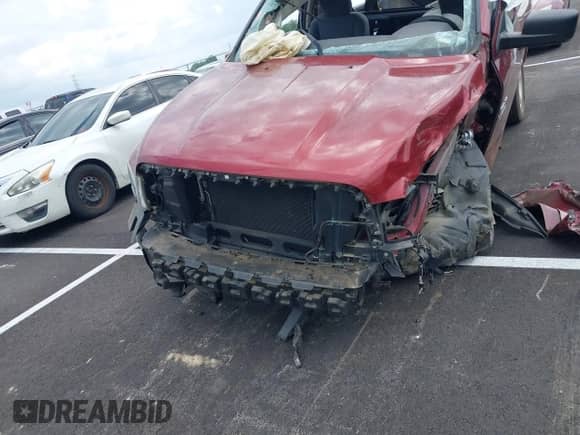 2014 Ram 1500 Express z VIN 3C6JR6ATXEG310186, wystawiony jako IAAI lot #42221601 z przebiegiem 56 684 mil mil oraz . Historia ofert i sprzedaży dostępna na DreamBid. Obrazek 12.