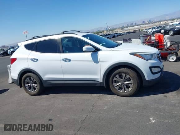 2016 Hyundai Santa Fe with VIN 5XYZU3LBXGG316388, listed as a IAAI auction lot 43215922 with 123,510 mi miles and . Bid and sale history available at DreamBid. Image 14.