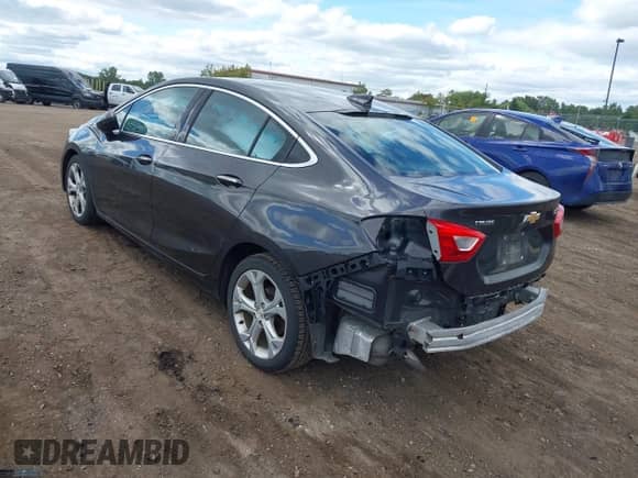 2016 Chevrolet Cruze Premier with VIN 1G1BG5SM5G7326047, listed as a IAAI auction lot 43120042 with 93,404 mi miles and . Bid and sale history available at DreamBid. Image 3.